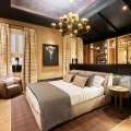 Espacios Casa Decor 2023: Dormitorio con vestidor «Nara, cabaña urbana»